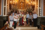 Participativa ofrena floral i d'aliments al Santíssim Crist de la Pietat