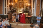 Participativa ofrena floral i d'aliments al Santíssim Crist de la Pietat