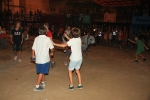 Centenares de niños disfrutan con el encierro de carretones embolados
