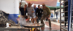 Las paellas de L'Axiamo desafan la lluvia