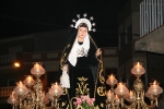 El silencio marca la procesión del Santo Entierro